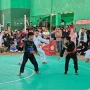 Dua atlet pancak silat pasang badan di gelanggang Kejuaran Pancak Silat Antar Perguruan IPSI tahun 2026.