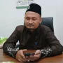 KH Ahmad Halimy Kepala Seksi Penyelenggara Haji dan Umrah Kemenag Sumenep, KH. Ahmad Halimy, saat ditemui porosbaru di ruangannya. (foto:porosbaru.com/aditya)